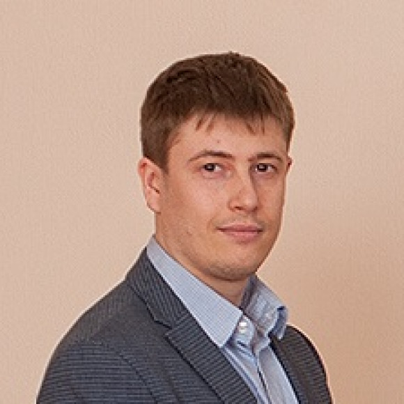 На фотографии Мочула Андрей Викторович